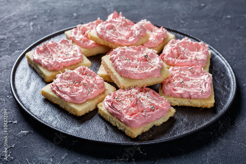 shortbread cookies with pink frosting, top view