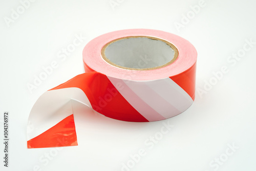 signal tape for fencing the territory on a white background