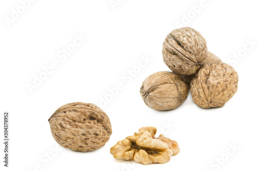 organic walnuts isolated on white background © fotodiya83