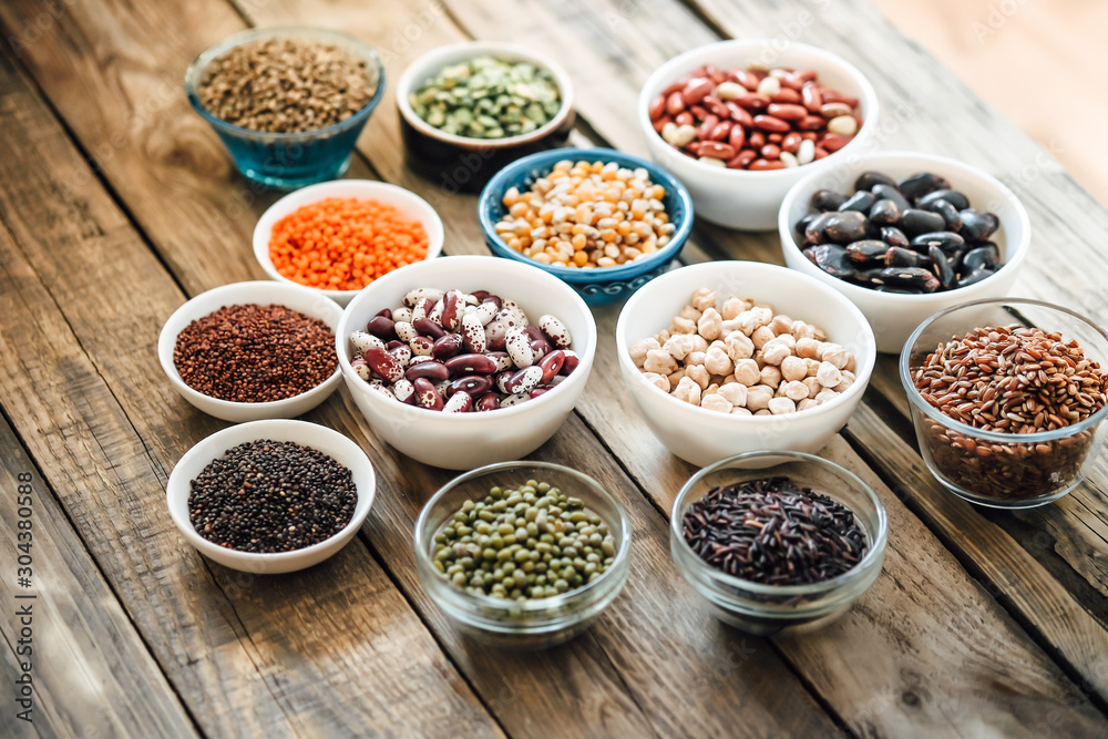 Super food. Seeds and beans assortment on a rustic background copy space. Vegetarians. Super food. Seeds and beans assortment on a rustic background copy space. Vegetarians.