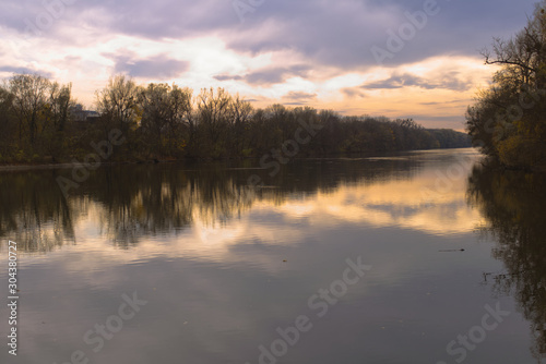 Colourful sunset reflecting in the river Isar in Munich, Germany