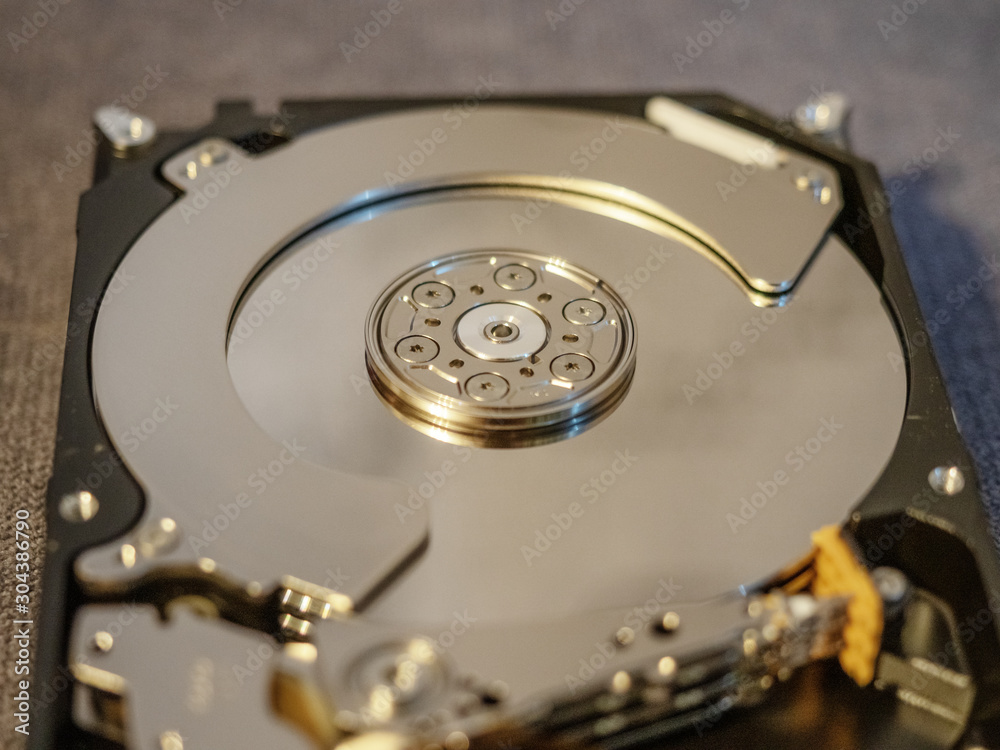 Open hard drive for repair close frame on gray background Open hard drive for repair close frame on gray background