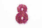 Figure 8 of bright sequins on white background