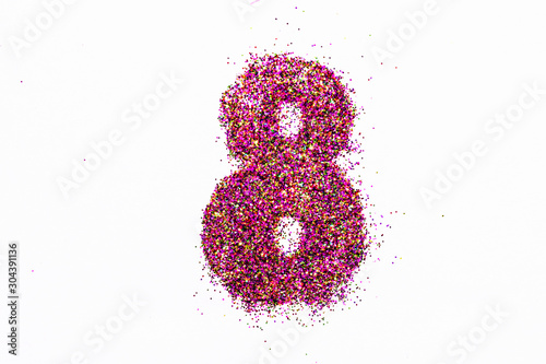 Figure 8 of bright sequins on white background