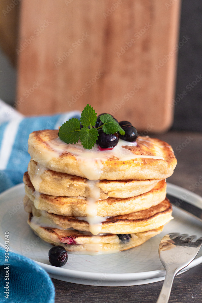 pancakes with berries and condensed milk