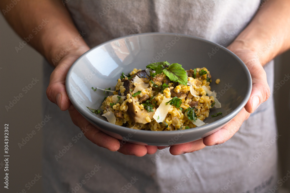 bulgur with vegetables and meat on a plate bulgur with vegetables and meat on a plate