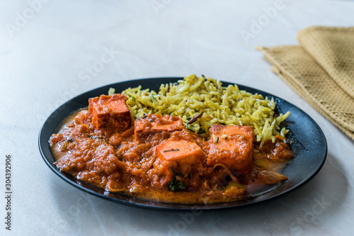Indian Food Paneer Butter Tikka Masala / Cheese Cottage Curry and Jeera Zira Rice Basmati Pilaf or Pilav.