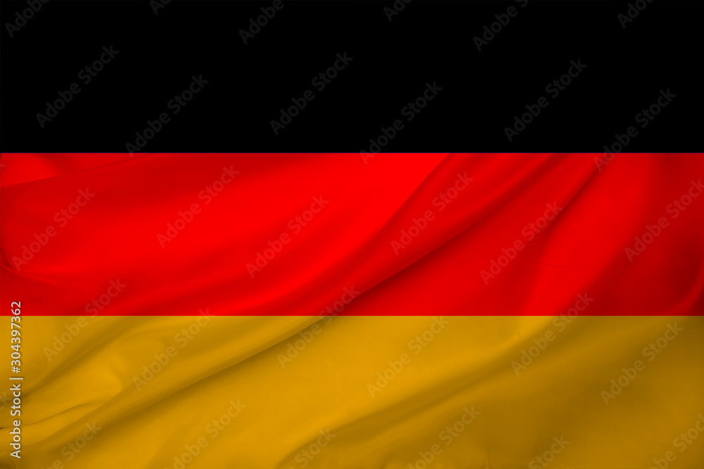 beautiful photo of the colored national flag of the modern state of Germany on textured fabric, concept of tourism, emigration, economics and politics, closeup beautiful photo of the colored national flag of the modern state of Germany on textured fabric, concept of tourism, emigration, economics and politics, closeup
