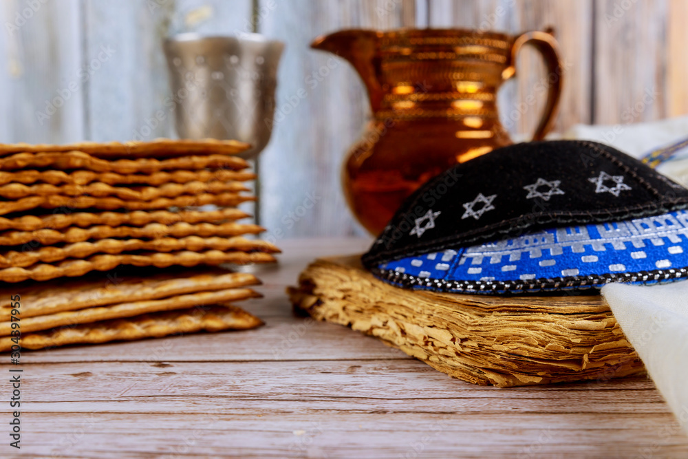 Passover matzoh jewish holiday with kosher wine with kipah and tallit