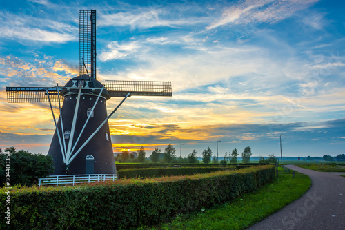 Old dutch windmill by the sunset in Etten-Leur, North Brabant