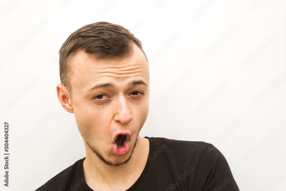 emotion frowning, young man on a white background, human emoji emotion frowning, young man on a white background, human emoji