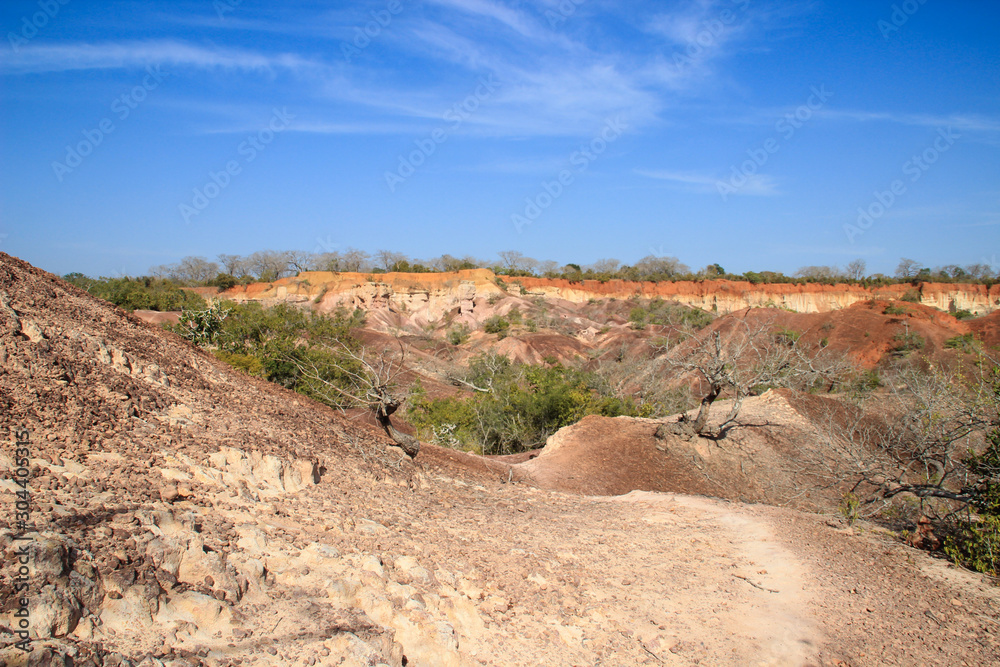 The famous attraction in Kenya is the gorge of Hell's Kitchen - stones and rocks with colorful sand near Marafa, Malindi. East Africa Erosion of sand cliffs.
