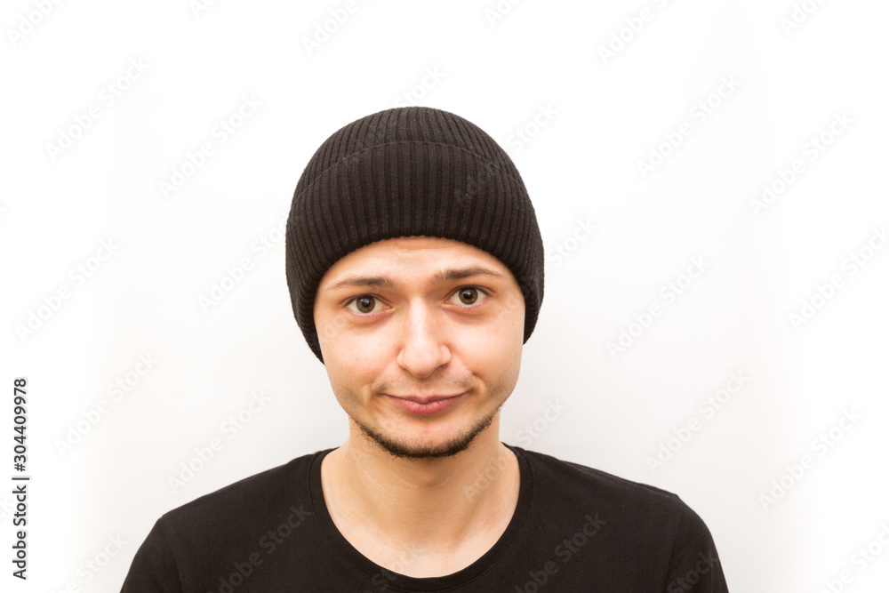 emotion confused, young man in a black cap on a white background, man emoji