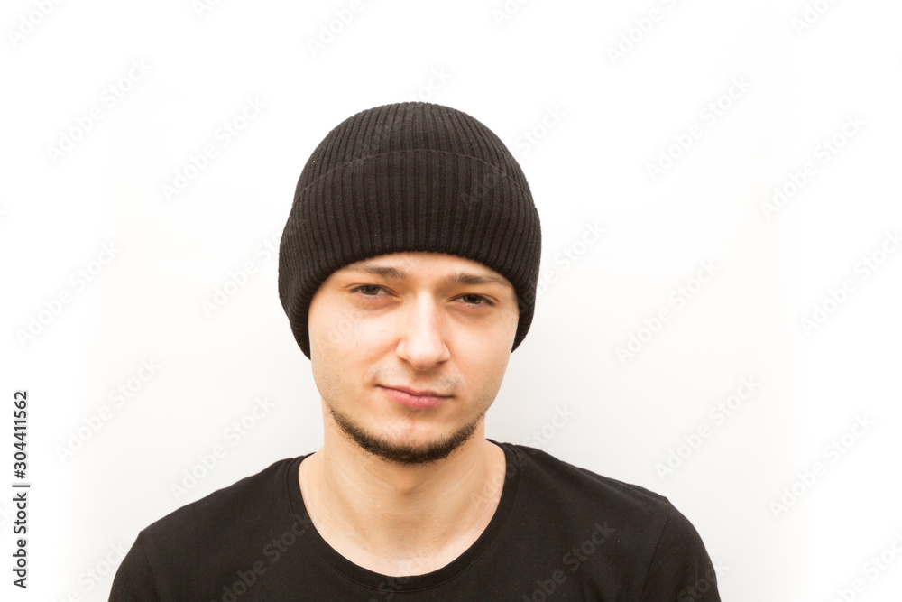 emotion relaxed, young man in a black cap on a white background, man emoji