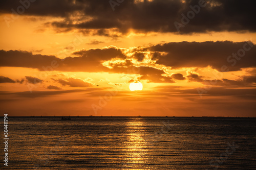Sun shining over Alghero shore at sunset © Gabriele Maltinti