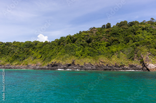 mountain stone coast and sea view in yacht cruise at Phuket, Thailand
