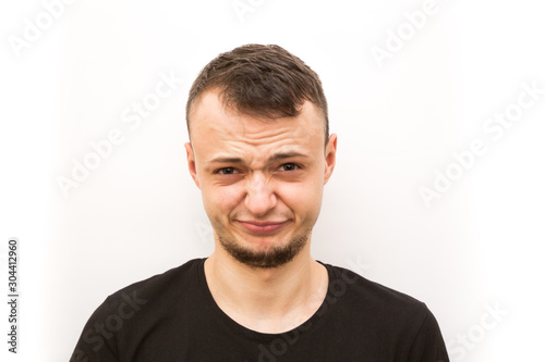 emotion worried, young man in a black cap on a white background, man emoji