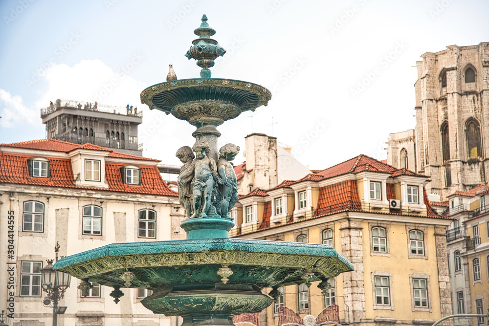 Rossio Square with fountain and sculpture, Lisbon