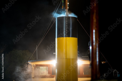 Photo Smoking chimney of a ferry boat during voyage