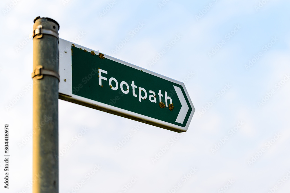 metal footpath sign over sky background in uk metal footpath sign over sky background in uk