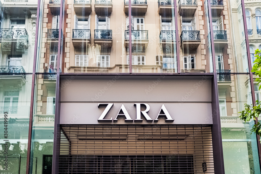 Valencia, Spain - November 17, 2019: Facade of the Zara clothing store,  belonging to the multinational Inditex. Stock Photo | Adobe Stock