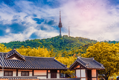 Namsangol Hannok Village and Seoul Tower Located on Namsan Mountain at night in Seoul,South Korea.