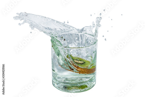 isolated glass with fresh cold drink with kiwi splash drop fall