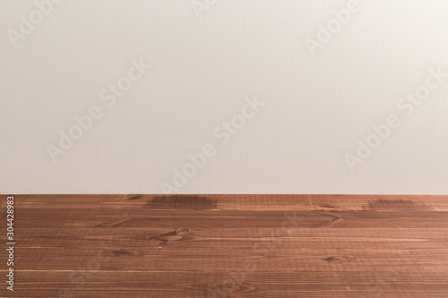 Wooden board empty table in front of a blurred background. Perspective brown wood over blurry background - can be used to showcase or assemble your products. Mock up to display the product.