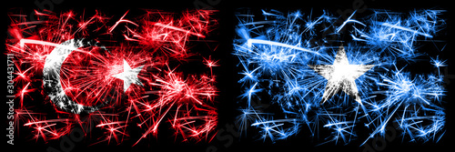 Turkey, Turkish vs Somalia, Somalian New Year celebration sparkling fireworks flags concept background. Combination of two abstract states flags. © Vlad