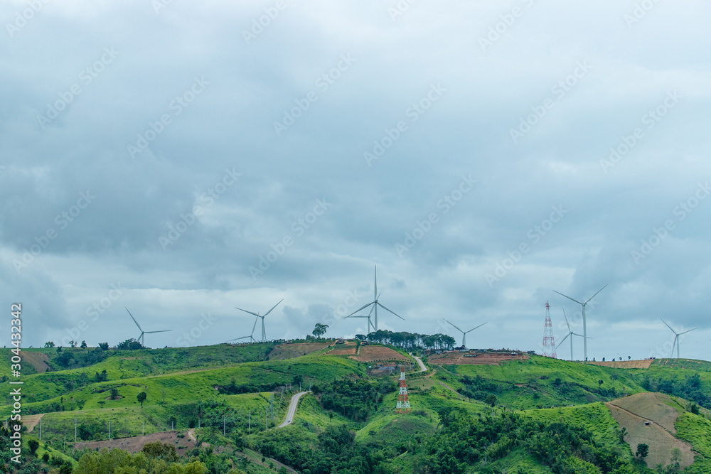 Silhouetted windmills at Khao Kho in the countryside Silhouetted windmills at Khao Kho in the countryside