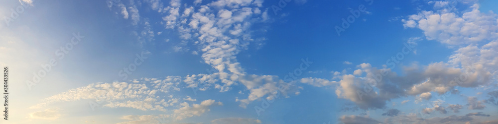 Panorama sky with cloud on a sunny day. Beautiful cirrus cloud. Panoramic image. Panorama sky with cloud on a sunny day. Beautiful cirrus cloud. Panoramic image.