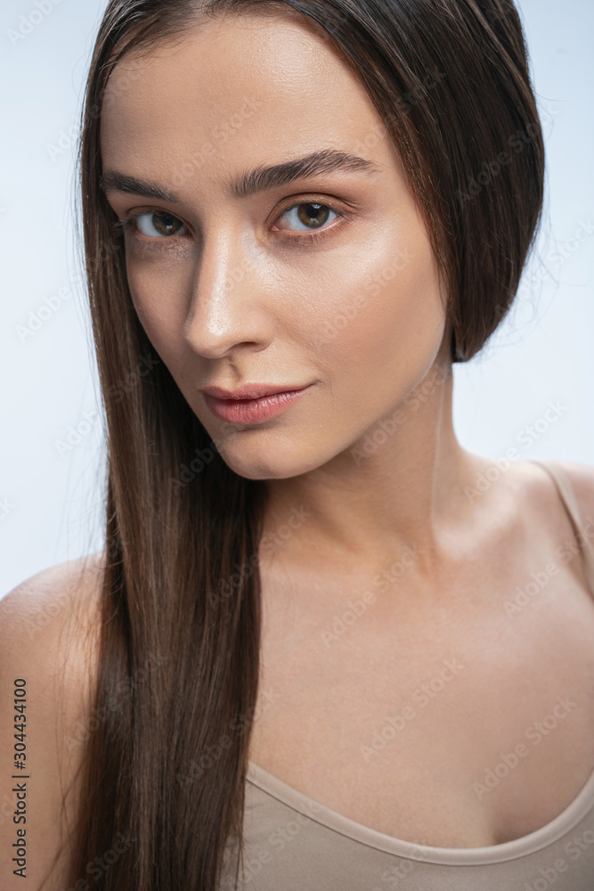 Portrait of cute woman that looking at camera