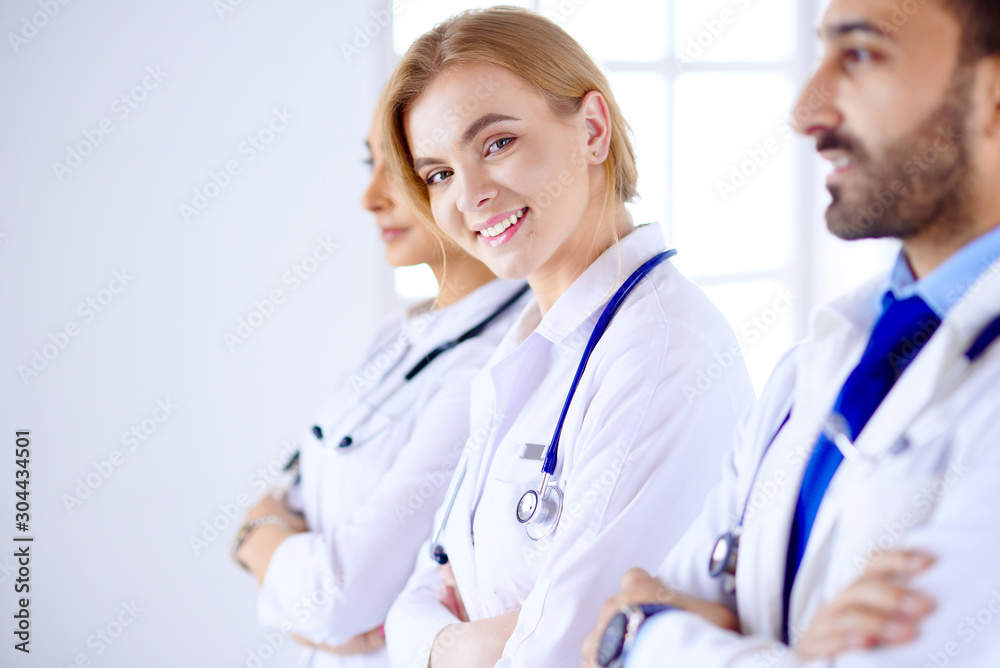 Attractive female doctor in front of medical stuff Attractive female doctor in front of medical stuff