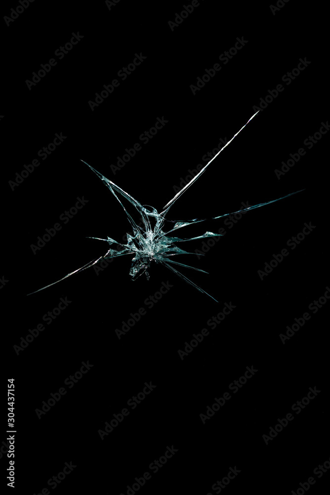 Fototapeta premium abstraction crack on broken glass and mirror on an isolated background