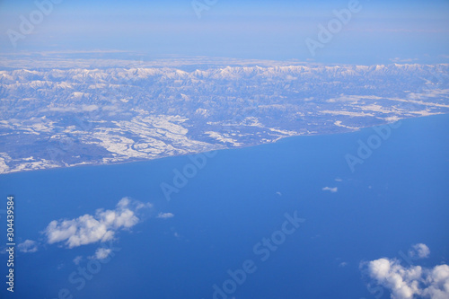 Bird view of snow and sea
