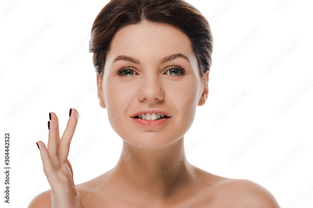 happy naked woman with face cream on finger looking at camera isolated on white happy naked woman with face cream on finger looking at camera isolated on white