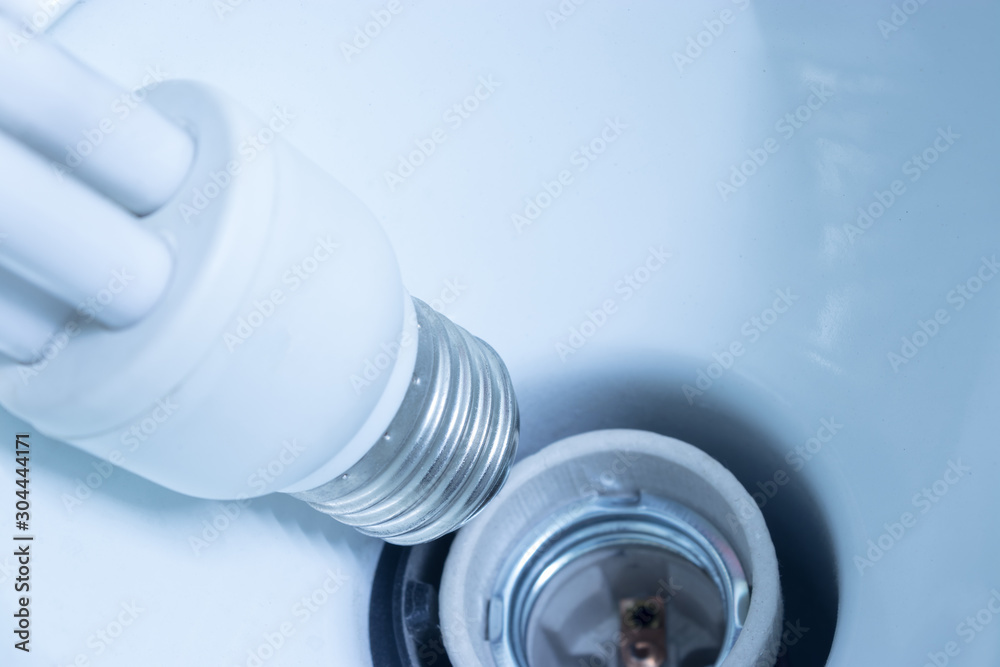 A white fluorescent lamp in a reading lamp A white fluorescent lamp in a reading lamp