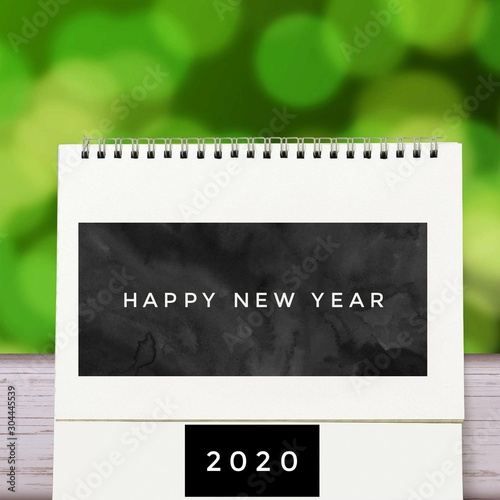 Happy New year 2020 calendar Format Good for new year's greeting.Cover of business diary for 2020 with wishes. Brochure design template, card, banner. Green abstract Background.