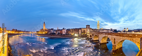 The Pietra Bridge, the Basilica of Santa Anastasia and the river Adige in the city center of Verona. Veneto, Italy, Europe.