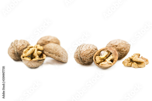 organic walnuts isolated on white background