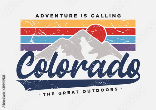 colorado typography slogan with sun and mountain illustration for fashion print and other uses photo