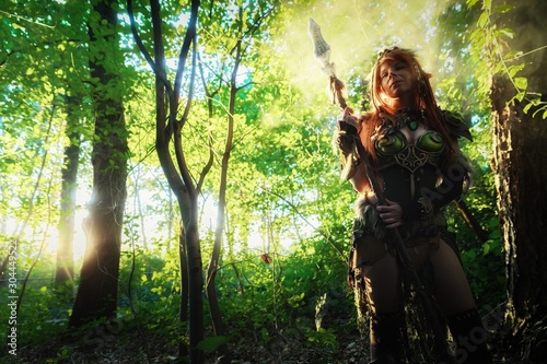 Elven warrior woman in the deep forest