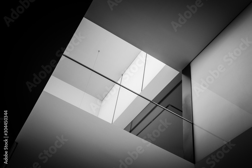 skylight or light well in interior building, natural light falling from the top.
