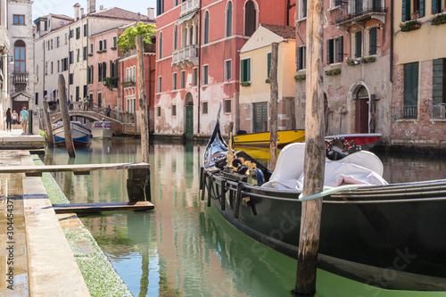 Close-up image of a gondola in Venice awaiting tourists