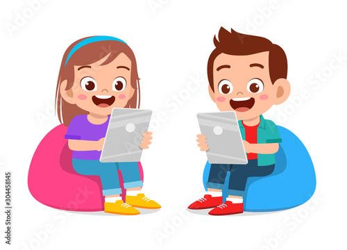 happy cute kids boy and girl using tablet