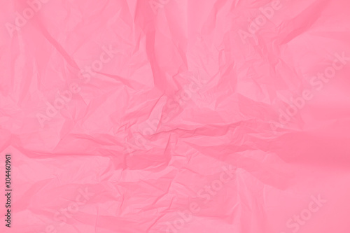 Crumpled pink paper texture, pink background, wallpaper