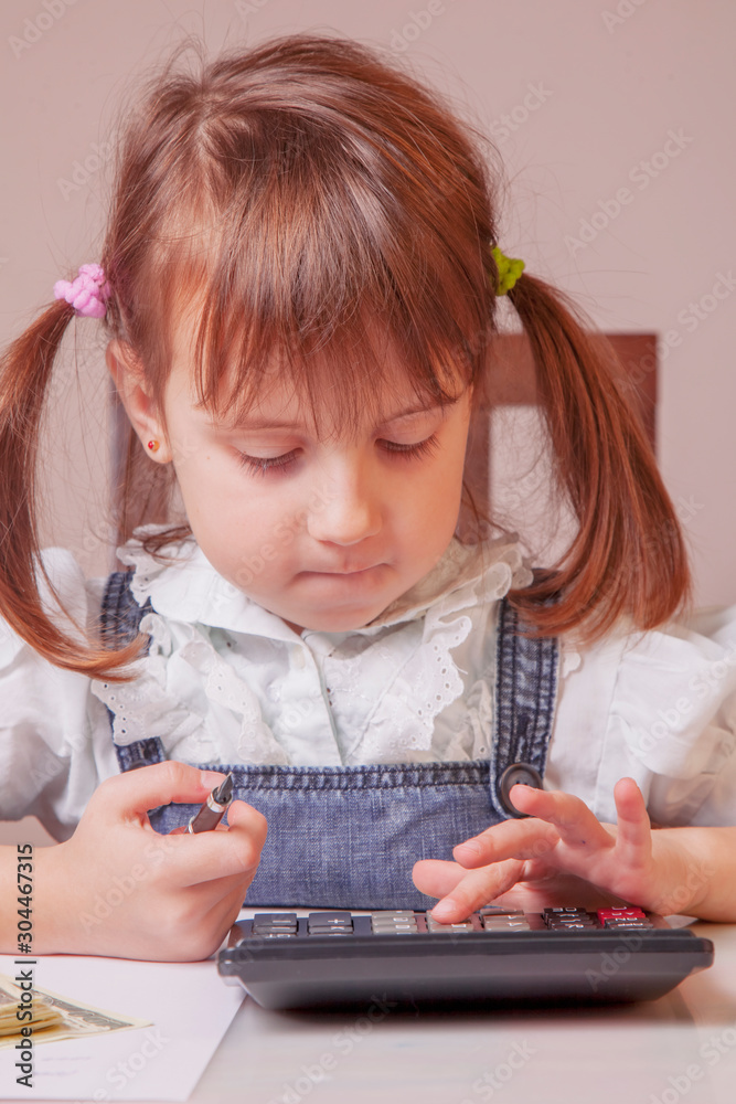 Humorous photo of young business girl calculate profit US Dollar banknotes money with calculator. Humorous photo of young business girl calculate profit US Dollar banknotes money with calculator.