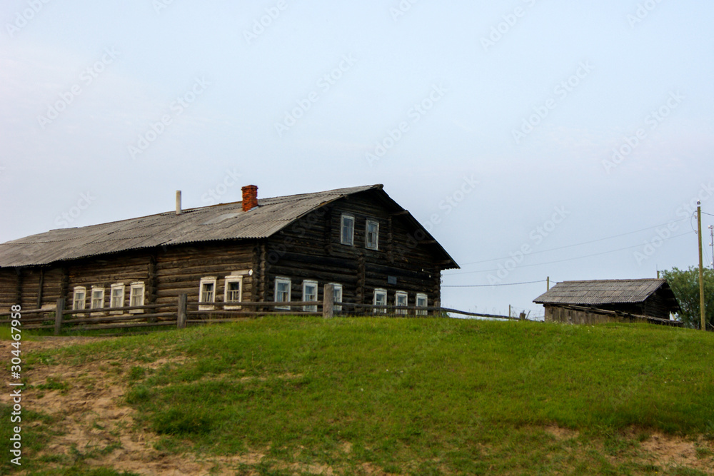 old house in a summer village old house in a summer village