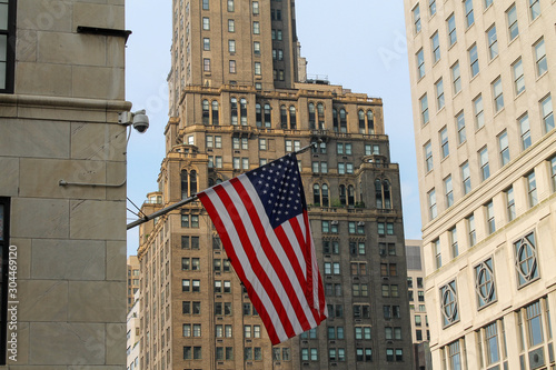 American flag hanging on the building in Manhattan