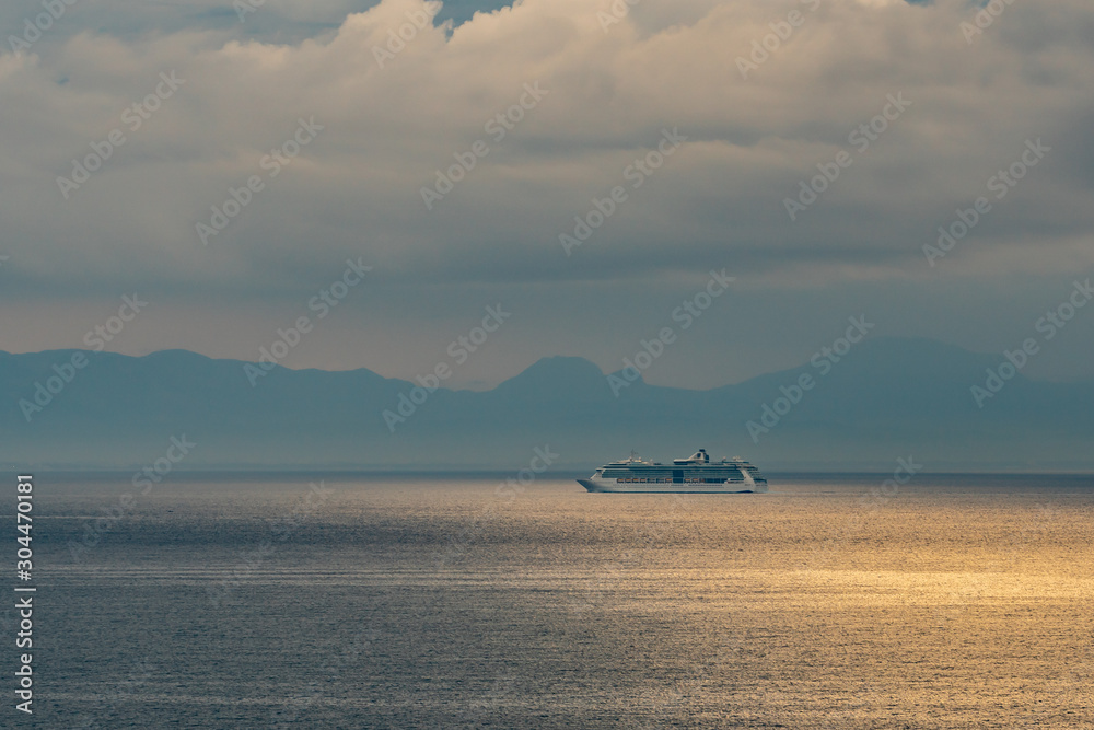 Distant view of touristic ship in the mediterranean sea. Travel.
